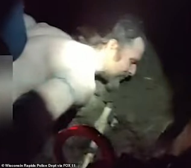 The ambulance became stuck in a muddy field where Feltz allegedly refused to get out. Officials approached the vehicle with the help of a drone and arrested him while he was naked