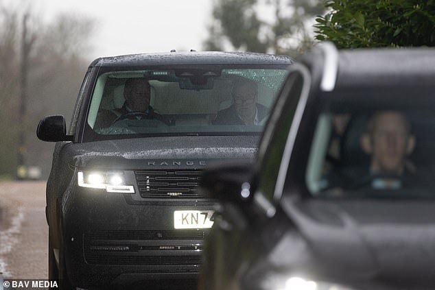 Onlookers said the group of eight people were in plain clothes 'but appeared to be police officers'. A convoy then left