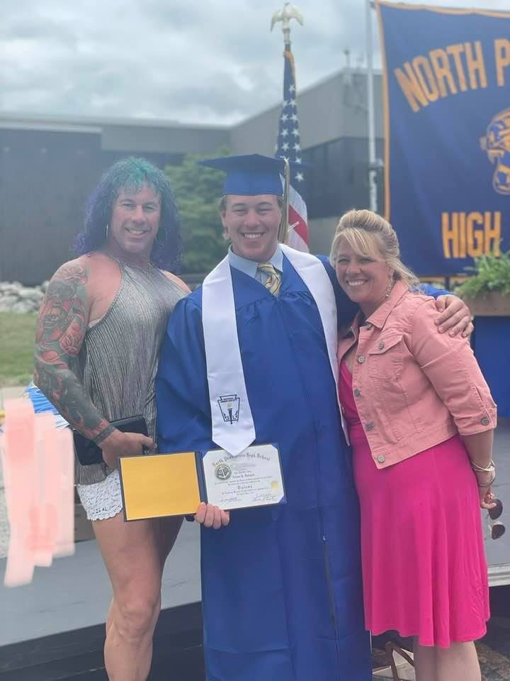 Roberta Esposito (aka Robert Dorgan) and Rhonda Dorgan with Aidan Dorgan at his graduation.