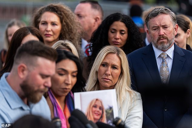 Marjorie Taylor Greene, second from right, and Thomas Massie, right, attend a news conference regarding the Epstein Files Transparency Act, outside the U.S. Capitol