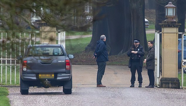 The gates opened as another vehicle arrived