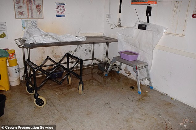 The squalid conditions inside the pait's mortuary with damp and mould visible on the walls
