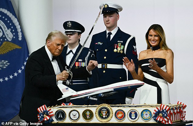President Donald Trump used his version of Air Force One as a cake topper during his 2025 inauguration. He cut the cake with a sword alongside First Lady Melania Trump (right) at the Commander-in-Chief inaugural ball