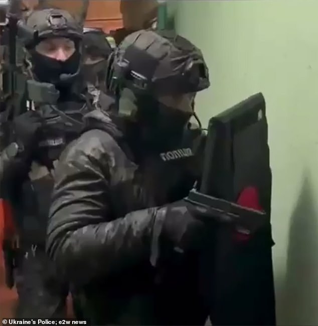 The targets of the intended contract killings included Ukrainian public figures, military intelligence officers, head of a strategic enterprise, fighters from Kyiv's foreign legion, and leading journalists. Pictured: Security service officers storm the flat of a suspect