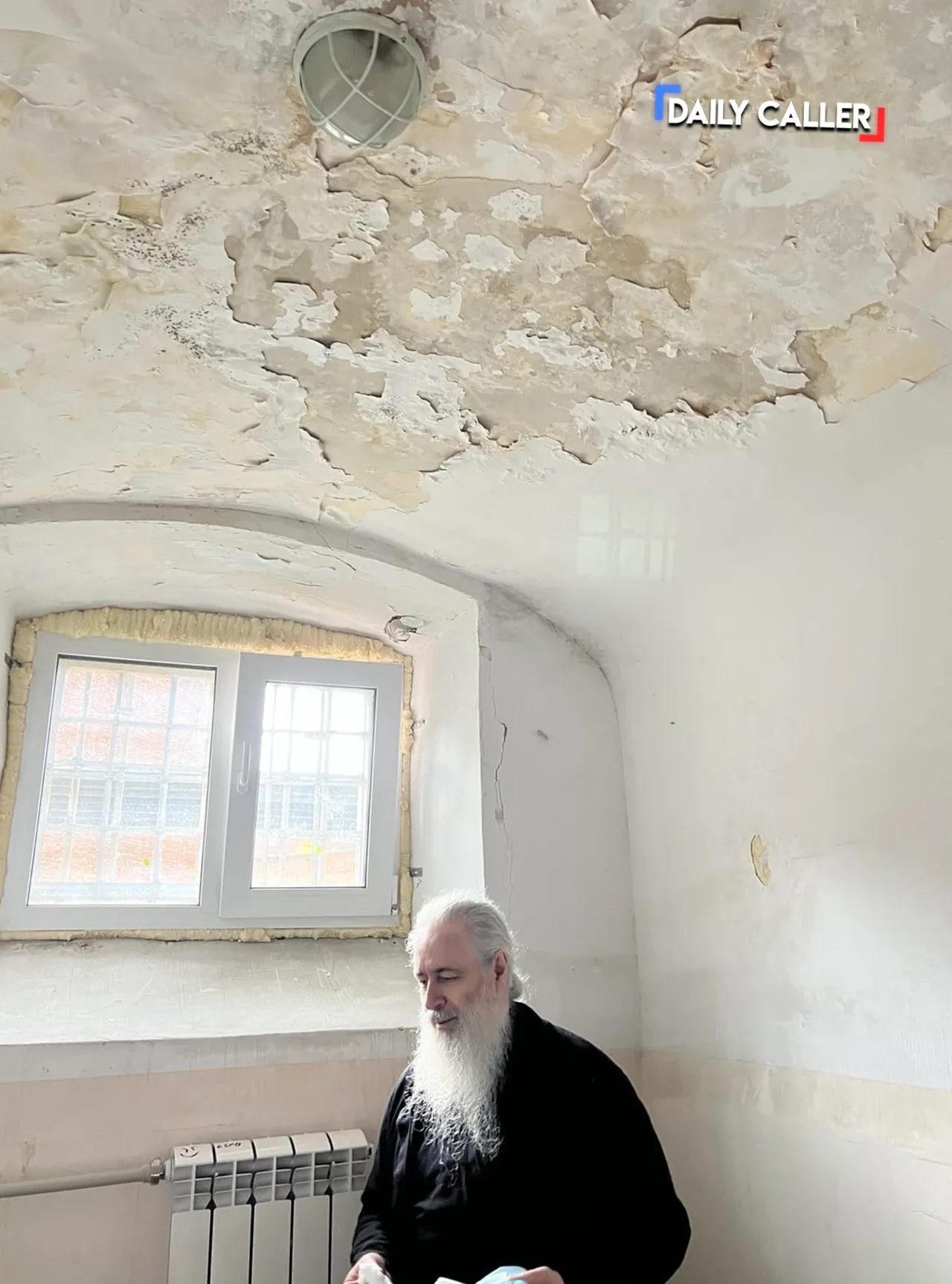 Metropolitan Arseniy, head of the Sviatohirsk Lavra monastery, has been detained without bail since April 2024 after allegedly sharing the approximate location of Ukranian road blocks. Photo shows Arseniy at the a detention facility in Dnipro, Ukraine where he shared the harsh conditions of his imprisonment. (Photo obtained by The Daily Caller)
