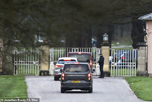 Police vans approach Royal Lodge, the former Windsor residence of Andrew Mountbatten Windsor, today, as searches continue following his arrest