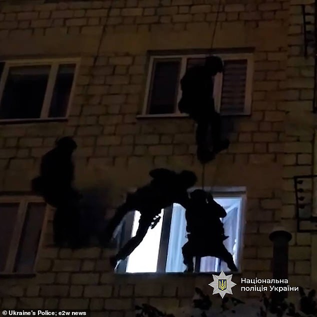 Special service officers were seen storming the window of a flat to seize a suspect, believed to be in Moldova.