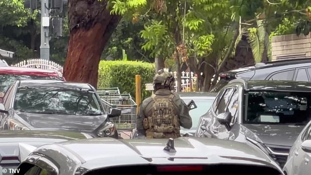 Shocked residents at the unit complex reported seeing a heavy police presence