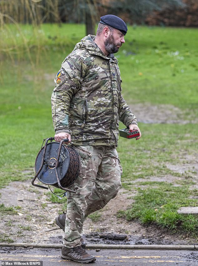 A bomb disposal technician (pictured) from the Royal Logistic Corps carried out a controlled explosion on the device