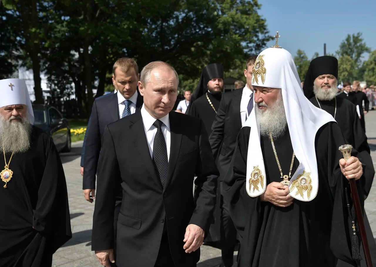 Russian President Vladimir Putin (L) and Russian Patriarch Kirill of Moscow visit a marine church during Navy Day in Saint Petersburg on July 30, 2017. (Photo credit ALEXEY NIKOLSKY/AFP via Getty Images)
