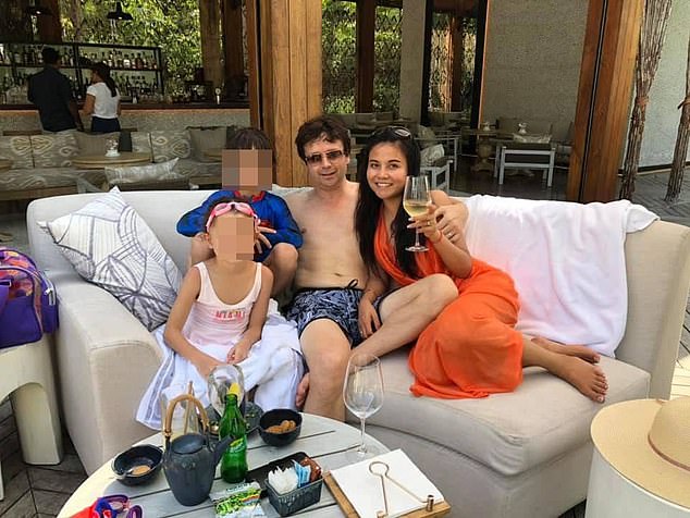 Mr Griffiths and Ms Kringsinthanakun pictured with their two children