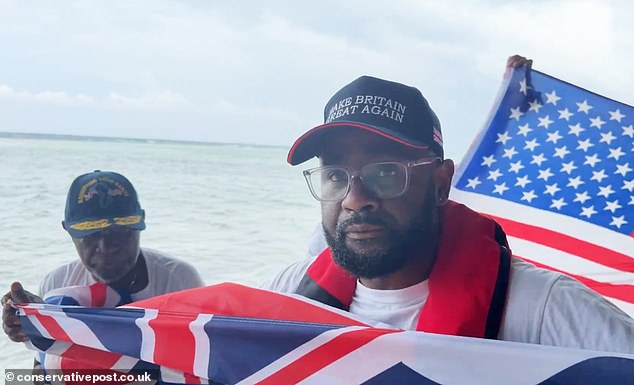 Misley Mandarin, right, and his father as they arrived on the archipelago in defiance of the British government¿s exclusion zone this week