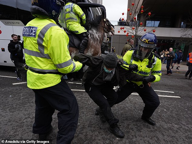Ahead of the planned marches, pictures emerged of protesters clashing with each other and the police