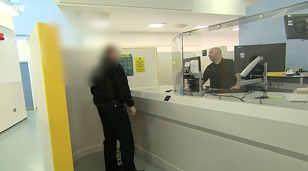 The suspect is taken to the front desk where they speak to a custody sergeant