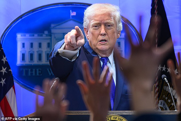 Trump during an emergency press conference at the White House on Friday, where he said he was 'ashamed' of the Supreme Court ruling, adding that America's highest court had been 'swayed by foreign interests'