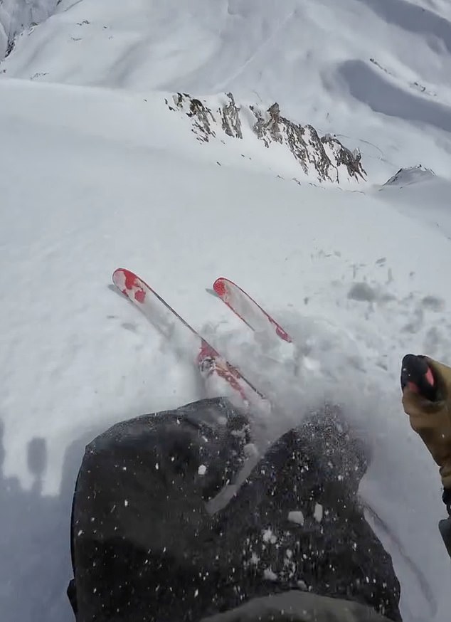The skier captured the moment the avalanche of snow began sweeping him away