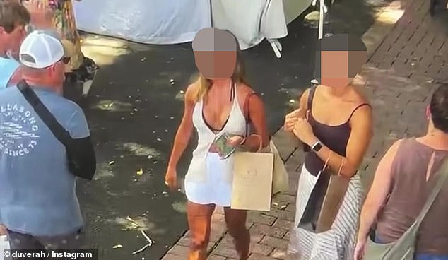 Shocking moment thieves are caught red-handed allegedly stealing handmade jewellery from market stall