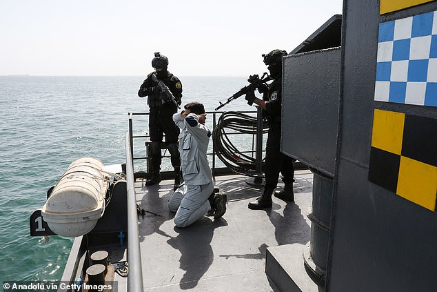 Trump has tried to make a deal that would stop Iranian nuclear enrichment in recent weeks but has still found the regime in Tehran resistant. Pictured: training exercises between Iran and Russia