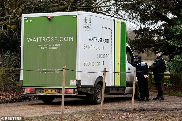 A Waitrose van was also pictured dropping off goods outside the Sandringham Estate today, as the driver stopped to speak to officers stationed outside