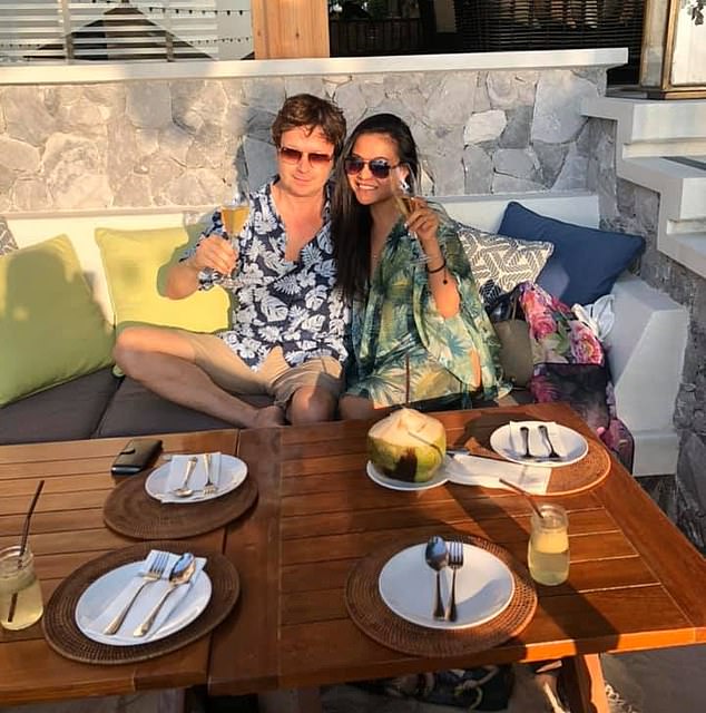 Ms Kringsinthanakun's social media shows her with her ex-husband in various locations around the world
