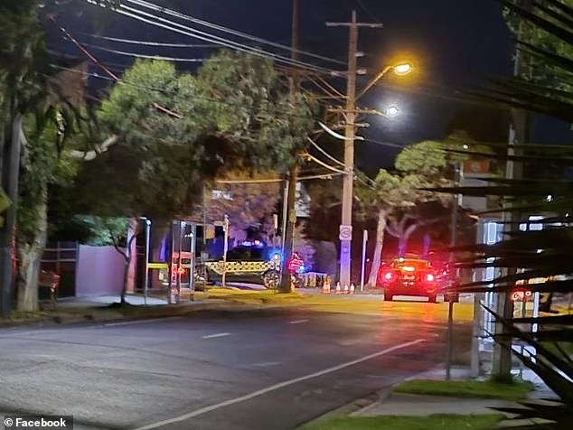 A crime scene was established at the home, where a ute was seen covered with police tape