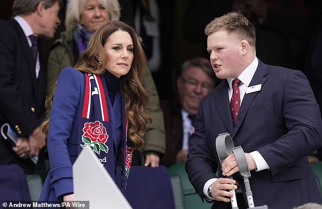The Princess of Wales with injured England player Fin Baxter in the stands before the Guinness Men's Six Nations match at the Allianz Stadium, Twickenham today
