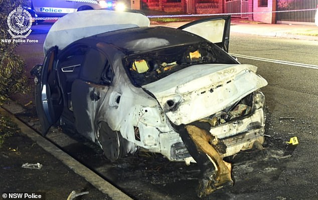 Cops swarm to a property in the hunt for missing Sydney grandfather Chris Baghsarian - hours after car found set alight was linked to his disappearance