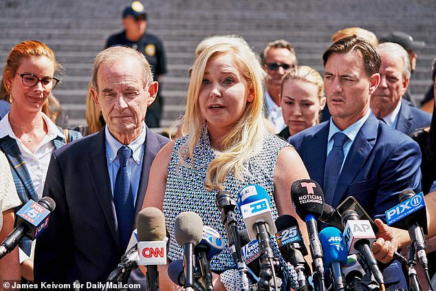 Virginia Giuffre pictured with attorneys David Boies (left) following a hearing in the Jeffrey Epstein case in 2019