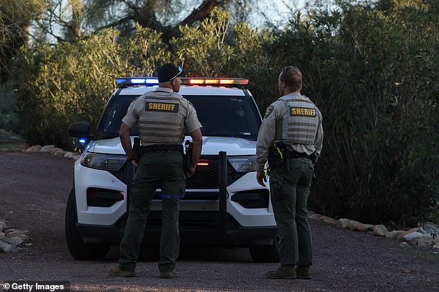 The sheriff's department has been met with increased scrutiny during the highly-publicized case. Deputies are pictured above on February 18 combing the neighborhood for clues