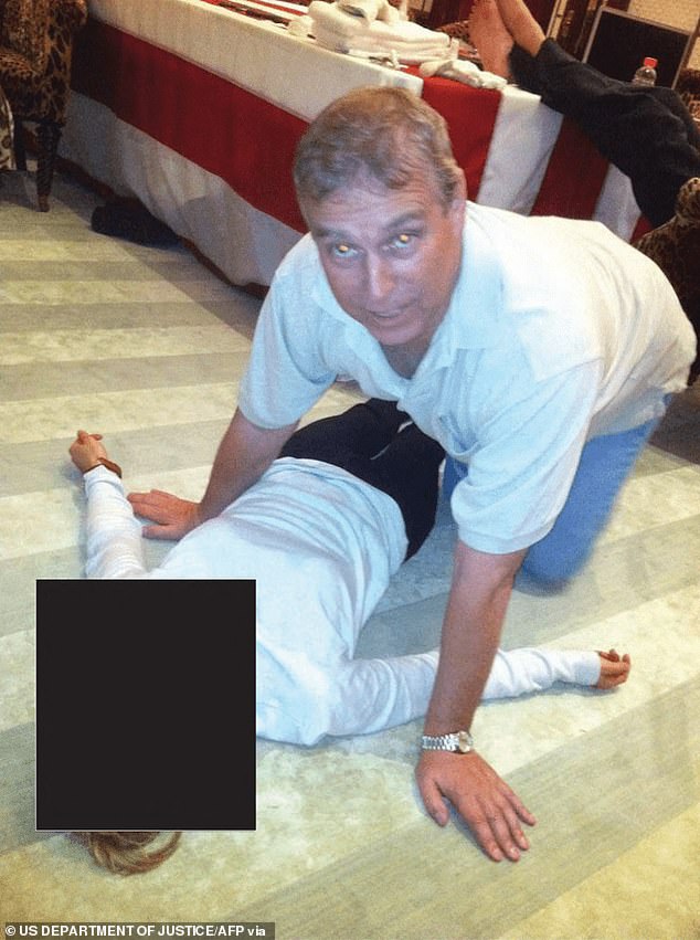 Andrew Mountbatten-Windsor kneeling over a woman lying on the floor in an image released by the Justice Department on January 30