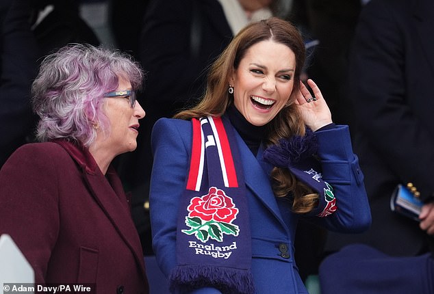 She was also seen laughing cheerfully while speaking with President of England's RFU, Deborah Griffin (left)