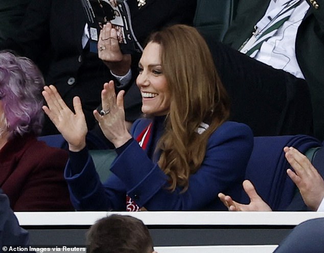 Kate celebrates after England player Fraser Dingwall scores just before half time