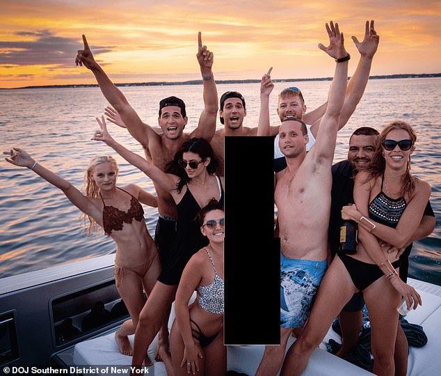 Tal Alexander (front, blue shorts) and identical twins Oren and Alon (back row) are facing federal sex trafficking charges in Manhattan court; they pled not guilty. Pictured is one of the photographs recovered from Tal's hard drive