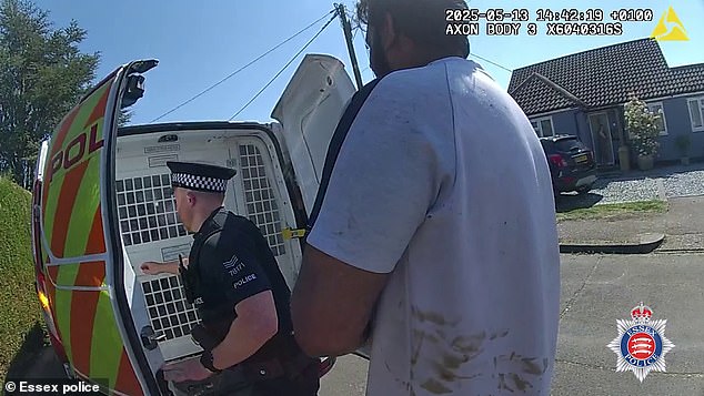 Pictured: The moment Rahman was put in the back of a police van