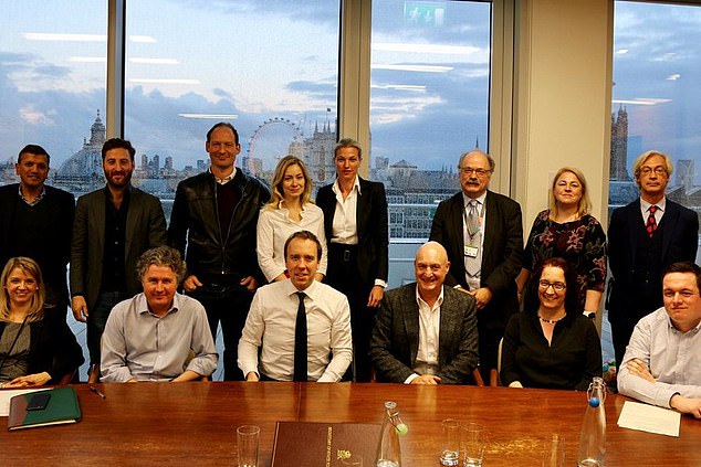 Junkermann pictured to the right above former health secretary Matt Hancock (centre), whom she convinced to appoint her to the government's influential 'Healthtech Advisory Board'