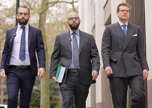 Last year Mr Magennis (left) was filmed outside the Home Office as he helped deliver an application to try to get Hamas removed from the proscribed terror group list