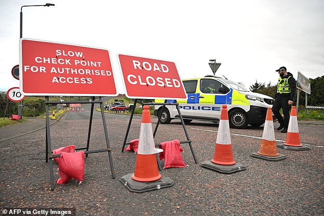 Eight hurt after car travelling the wrong way on the A1 ploughs head-on into vehicle: Man, 37, is arrested