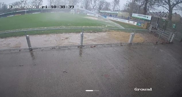 Relegation-threatened football club accused of deliberately flooding their pitch to postpone match - by turning on the sprinklers in heavy rain