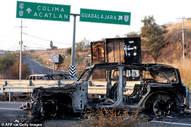 Burnt-down cars littered the highways in Jalisco following the raid to kill El Mencho
