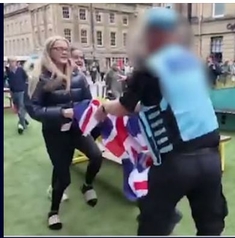 UK cop snatches Union Jack from protester