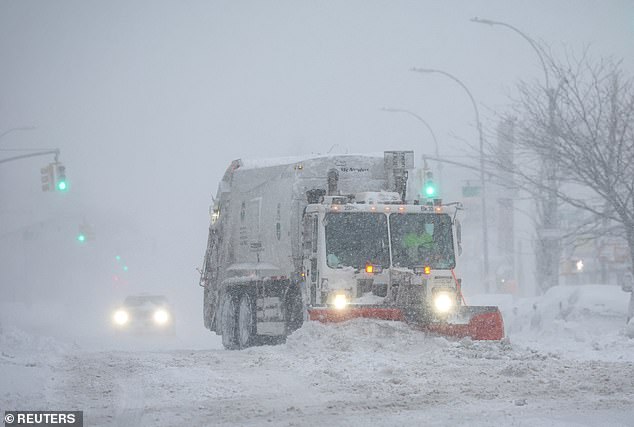 A New York City Department of Sanitation garbage truck in Brooklyn on Monday
