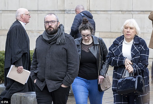 Natalie McNally's brother Brendan (second left) and family members outside Belfast High Court