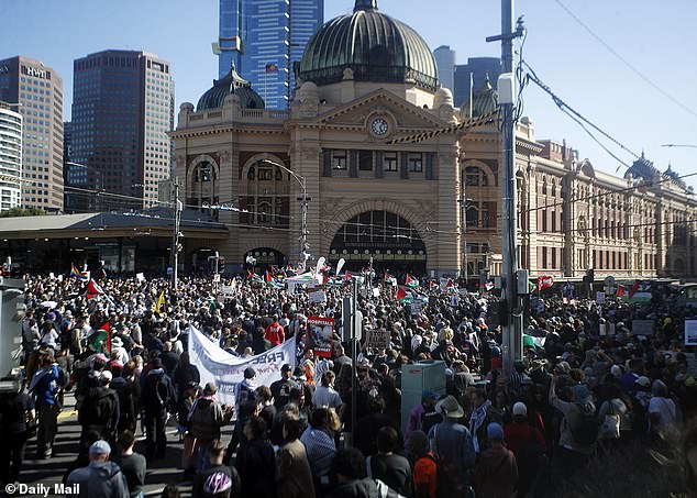 Protesters gathered outside Flinders St Station in Melbourne