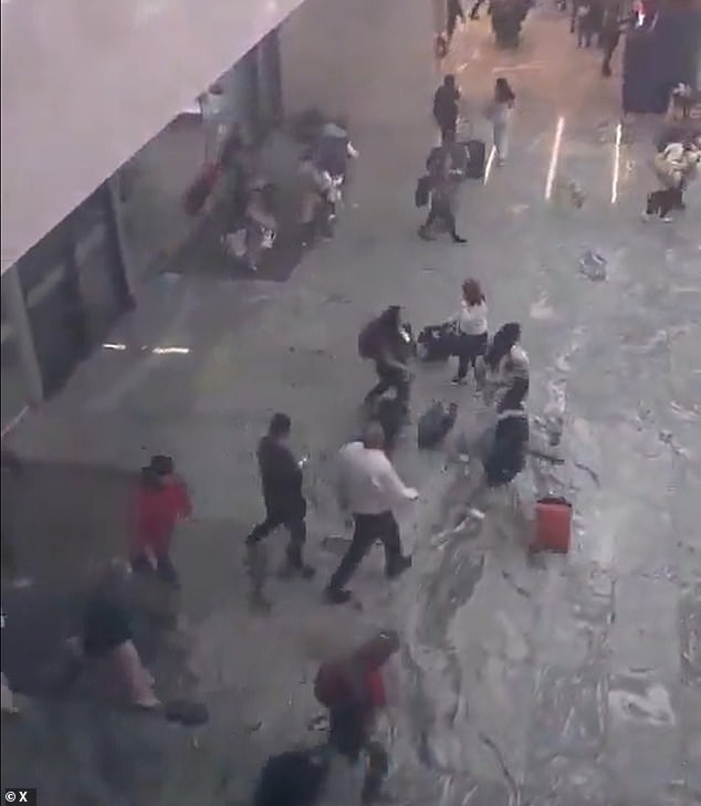 Hundreds of tourists were seen fleeing the airport