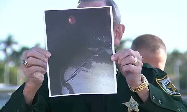 Police, showing an image of the shotgun, say he refused to drop the weapon and brought it to a shooting position before Secret Service agent fired and neutralized the threat