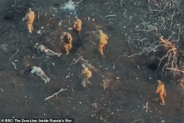 Russian commanders' brutal executions... of their OWN men: Soldiers describe pits filled with men shot for fleeing front line or sent on suicide 'meat storm' missions unarmed