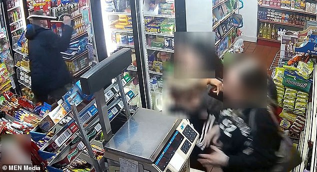 A mother and two children who were in the shop at the time cowered in terror as the violence unfolded