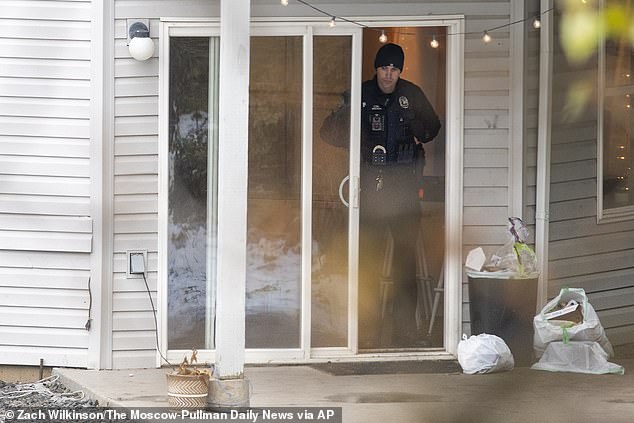 Investigators on the crime scene at the house hours after Kohberger broke in and killed four
