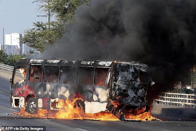 A bus set on fire by the cartel at one of the main avenues in Zapopan, state of Jalisco, Mexico, on Sunday in response to the killing of Oseguera Cervantes