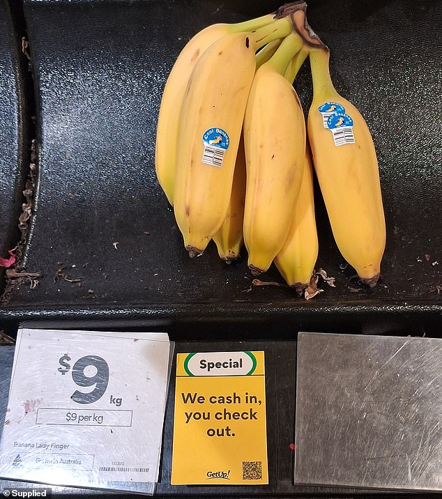 Pictured, one of the protest stickers at a Woolworths store